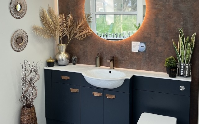 Vanity Hall fitted furniture in Midnight woodgrain with grey onxy corian basin & worktop